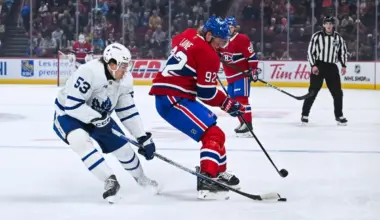 Toronto Maple Leafs forward Easton Cowan (53) defends the puck against Montreal Canadiens right wing Patrik Laine (92) during the first period at Bell Centre.