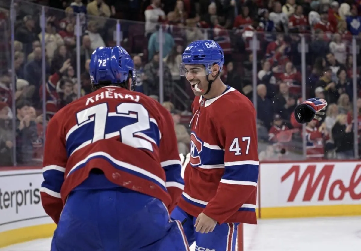 Montreal Canadiens defenseman Arber Xhekaj (72) and teammate defenseman Jayden Struble (47) celebrate the win against the Toronto Maple Leafs at the Bell Centre.