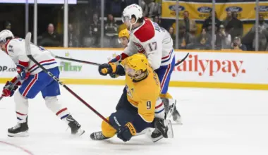Montreal Canadiens right wing Josh Anderson (17) checks Nashville Predators left wing Filip Forsberg (9) during the third period at Bridgestone Arena.