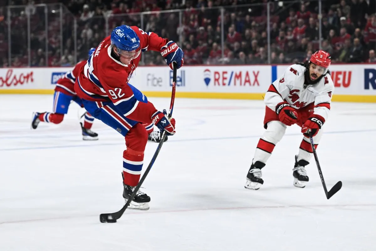 Montreal Canadiens right wing Patrik Laine (92) shoots the puck against the Carolina Hurricanes in the third period at Bell Centre.