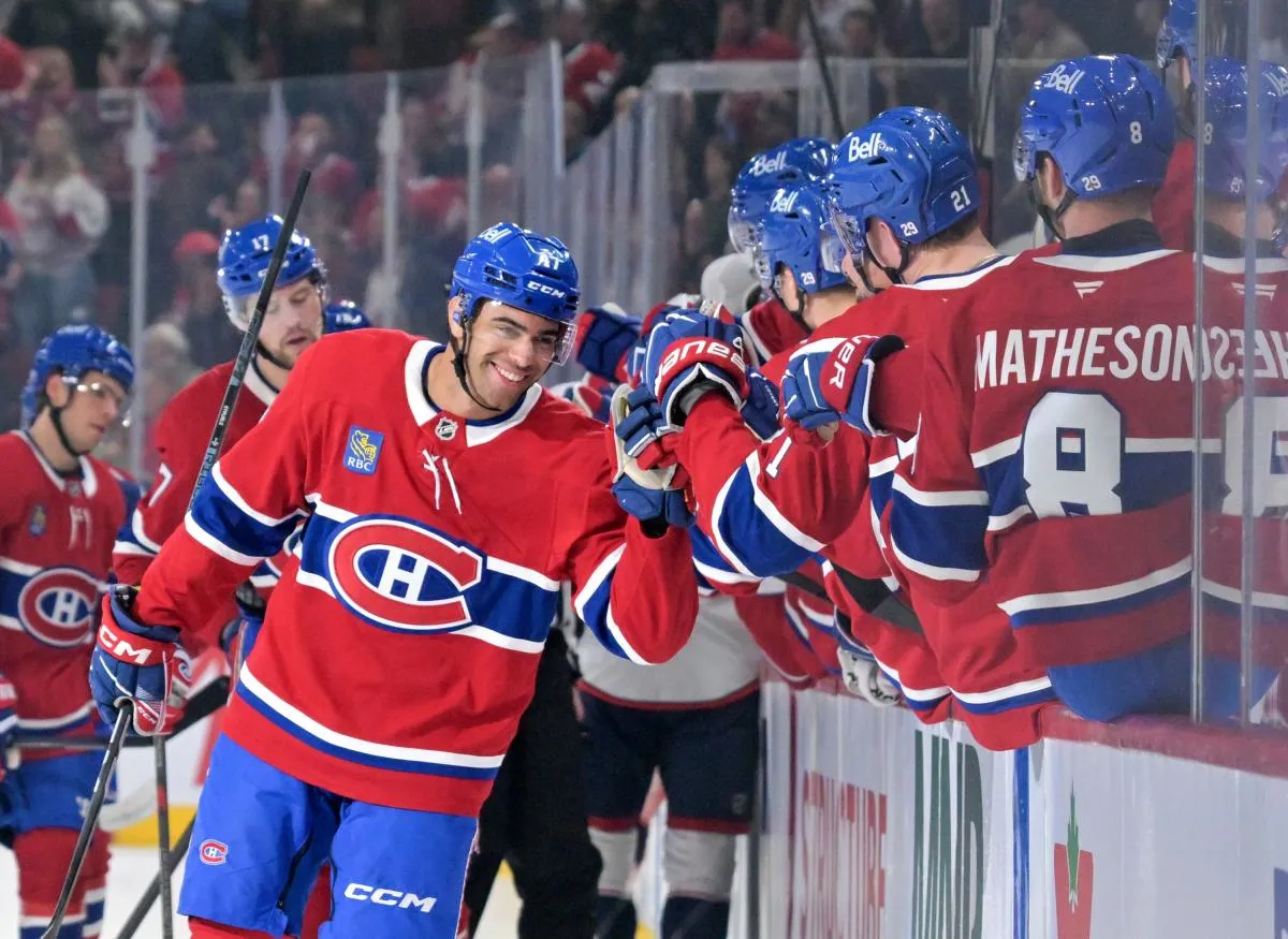 Montreal Canadiens defenseman Jayden Struble (47) celebrates with teammates after scoring a goal against the Columbus Blue Jackets during the first period at the Bell Centre.