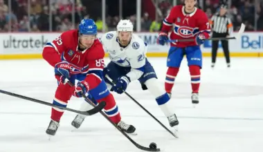 Montreal Canadiens forward Alexandre Texier (85) plays the puck and Tampa Bay Lightning forward Pontus Holmberg (29) defends during the second period at the Bell Centre.