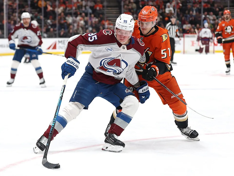  Victor Olofsson #95 of the Colorado Avalanche controls the puck past the defence of Olen Zellweger #51 of the Anaheim Ducks during the first period of a game at Honda Center on March 3, 2026, in Anaheim, California.