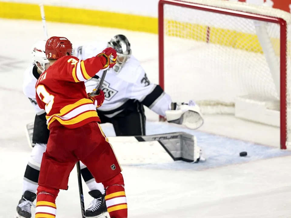  Flames defenceman Olli Maatta scores on Kings goalie Darcy Kuemper.