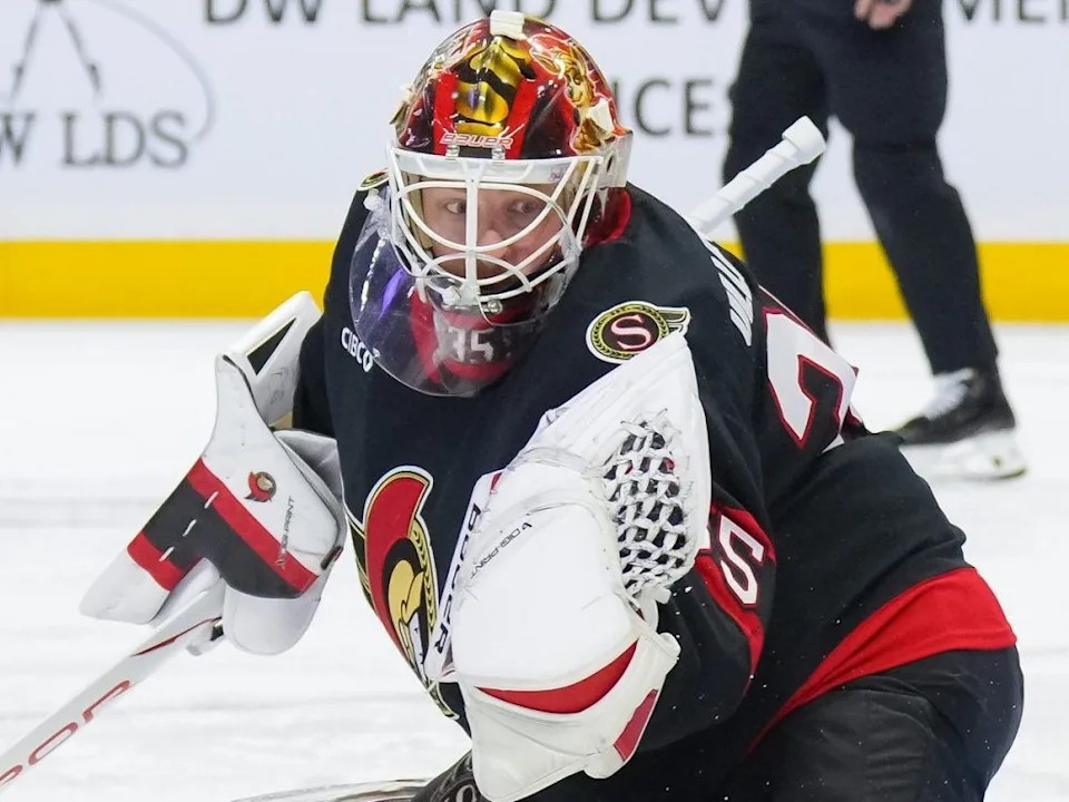  Linus Ullmark of the Ottawa Senators makes a glove save against the Montreal Canadiens in the first period at the Canadian Tire Centre on March 11, 2026.