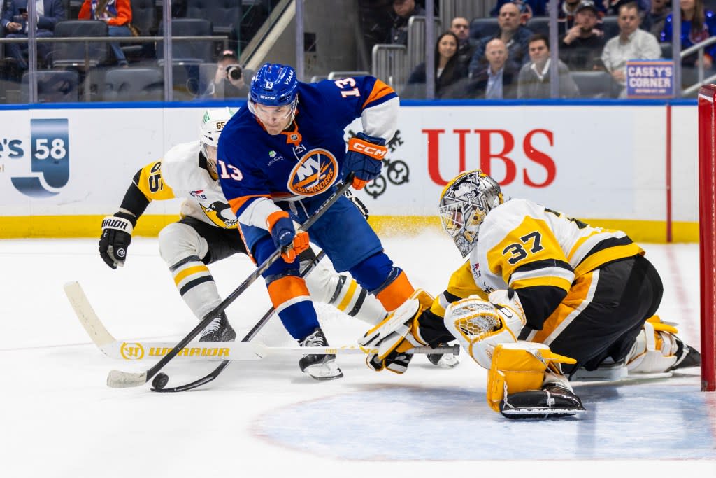 Arturs Silovs #37 of the Pittsburgh Penguins defends the net against center Mathew Barzal #13 of the New York Islanders during the first period at UBS Arena, Monday, March 30, 2026, in Elmont, NY. Corey Sipkin for the NY POST