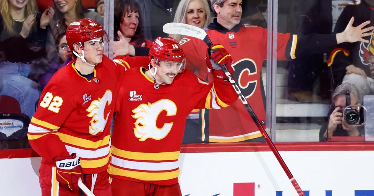 Flames ignite their offense, burn Canucks 7-3 | National Sports