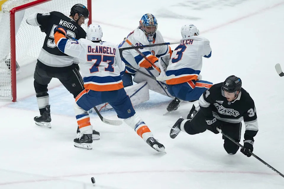 Playes scramble for possession during an NHL game between the New York Islanders and the Los Angeles Kings on Thursday, March 5, 2026 at Crypto.com Arena in Los Angeles Calif