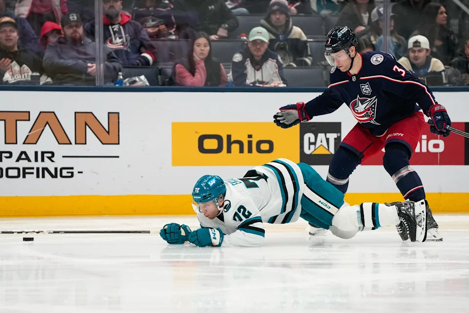 San Jose Sharks left wing William Eklund (72) trips on the stick of Columbus Blue Jackets center Charlie Coyle (3) in the third period of the NHL game at Nationwide Arena on Saturday, March 28, 2026 in Columbus, Ohio.