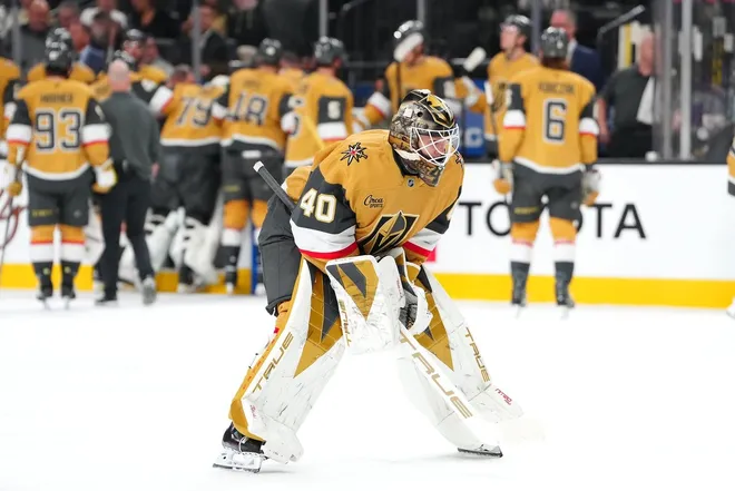 Jan 8, 2026; Las Vegas, Nevada, USA; Vegas Golden Knights goaltender Akira Schmid (40) enters the game as goaltender Carter Hart (79) is helped off the ice after an apparent injury against the Columbus Blue Jackets during the first period at T-Mobile Arena.