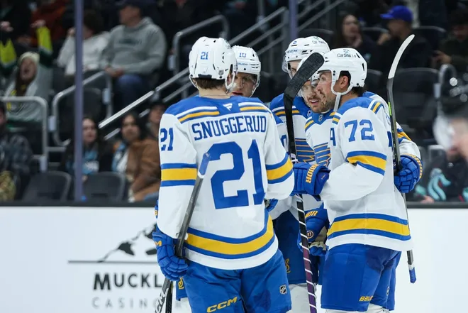 Mar 4, 2026; Seattle, Washington, USA; St. Louis Blues center Robert Thomas (18) celebrates with teammates after scoring a goal in the third period against the Seattle Kraken at Climate Pledge Arena.