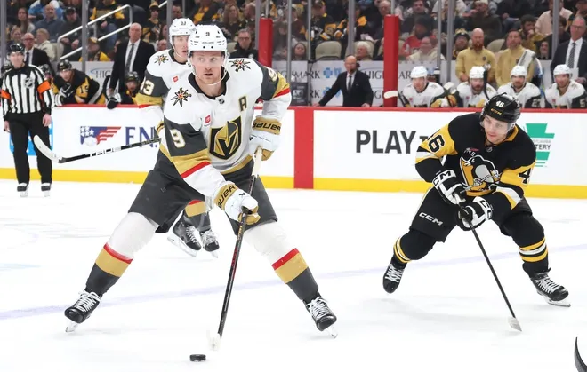 Mar 1, 2026; Pittsburgh, Pennsylvania, USA; Vegas Golden Knights center Jack Eichel (9) skates with the puck ahead of Pittsburgh Penguins center Blake Lizotte (46) during the second period at PPG Paints Arena.