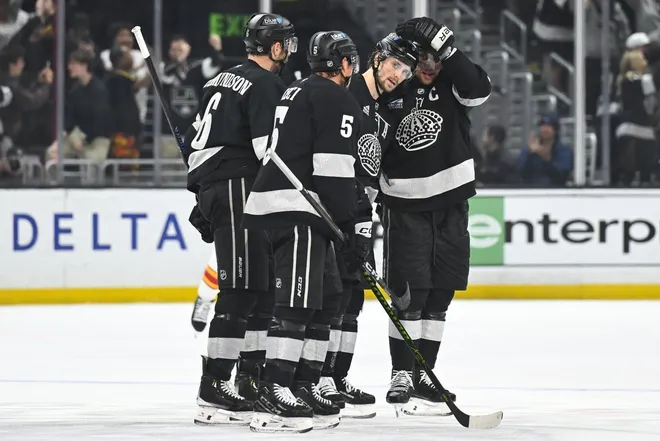 Feb 28, 2026; Los Angeles, California, USA; Los Angeles Kings celebrate after the goal scored by Los Angeles Kings right wing Adrian Kempe (9) during the third period against the Calgary Flames at Crypto.com Arena.