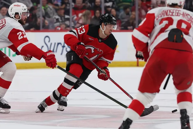 Mar 8, 2026; Newark, New Jersey, USA; New Jersey Devils left wing Jesper Bratt (63) skates with the puck against the Detroit Red Wings during the second period at Prudential Center.