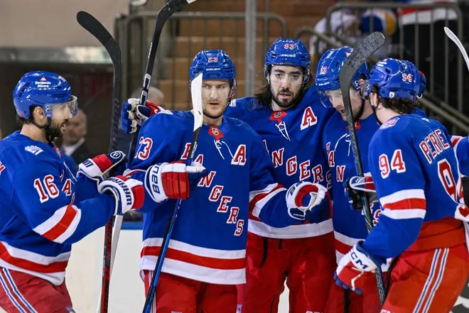 Mar 10, 2026; New York, New York, USA; New York Rangers center Vincent Trocheck (16), New York Rangers defenseman Adam Fox (23), New York Rangers center Mika Zibanejad (93) and New York Rangers right wing Gabe Perreault (94) celebrate the power play goal by New York Rangers left wing Alexis Lafrenière (13) against the Calgary Flames during the first period at Madison Square Garden.