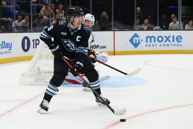 Mar 12, 2026; Salt Lake City, Utah, USA; Utah Mammoth right wing Clayton Keller (9) looks for a play against the Chicago Blackhawks during overtime at Delta Center.