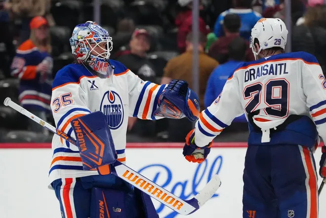 Mar 10, 2026; Denver, Colorado, USA; Edmonton Oilers goaltender Tristan Jarry (35) and center Leon Draisaitl (29) celebrate defeating the Colorado Avalanche at Ball Arena.