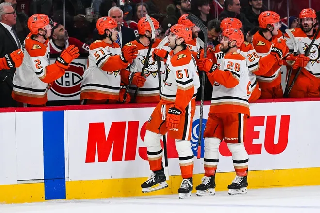 Mar 15, 2026; Montreal, Quebec, CAN; Anaheim Ducks left wing Cutter Gauthier (61) celebrates with his teammates at the bench his goal against the Montreal Canadiens during the third period at Bell Centre.