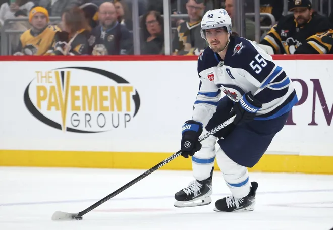 Mar 21, 2026; Pittsburgh, Pennsylvania, USA; Winnipeg Jets center Mark Scheifele (55) skates with the puck against the Pittsburgh Penguins during the second period at PPG Paints Arena.