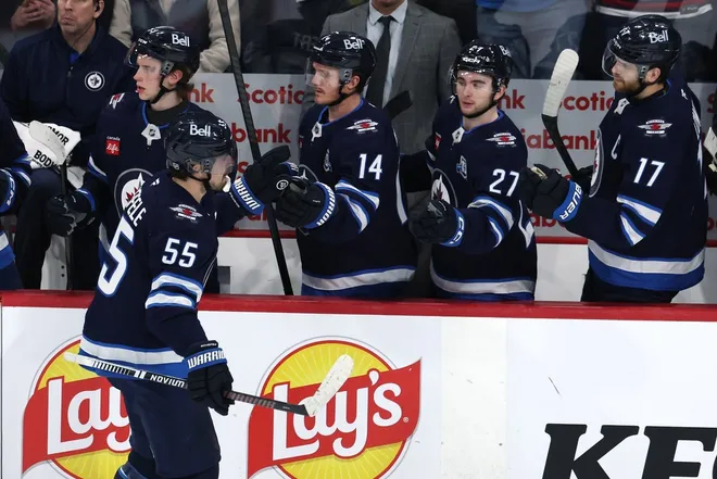Mar 26, 2026; Winnipeg, Manitoba, CAN; Winnipeg Jets center Mark Scheifele (55) celebrates a goal against the Colorado Avalanche in the third period at Canada Life Centre.