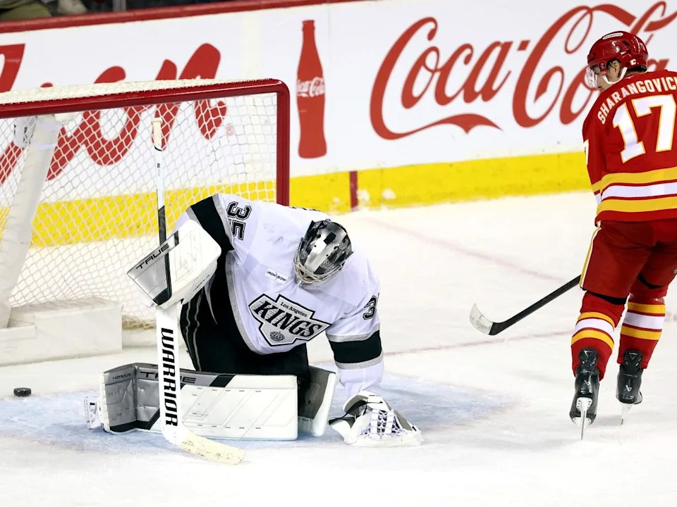  Flames forward Yegor Sharangovich beats Los Angeles Kings goalie Darcy Kuemper for the winning goal in the shootout on Tuesday.