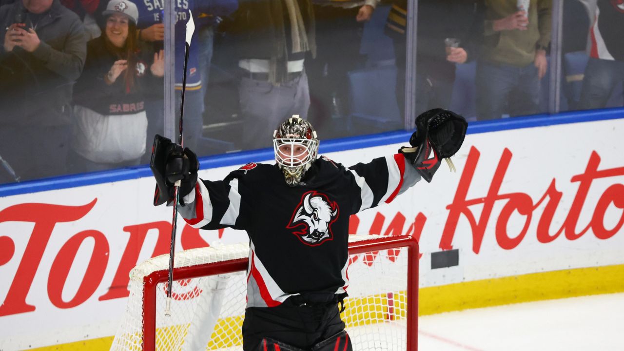 Buffalo Sabres goaltender Ukko-Pekka Luukkonen celebrates victory following the third period of an NHL hockey game against the Tampa Bay Lightning