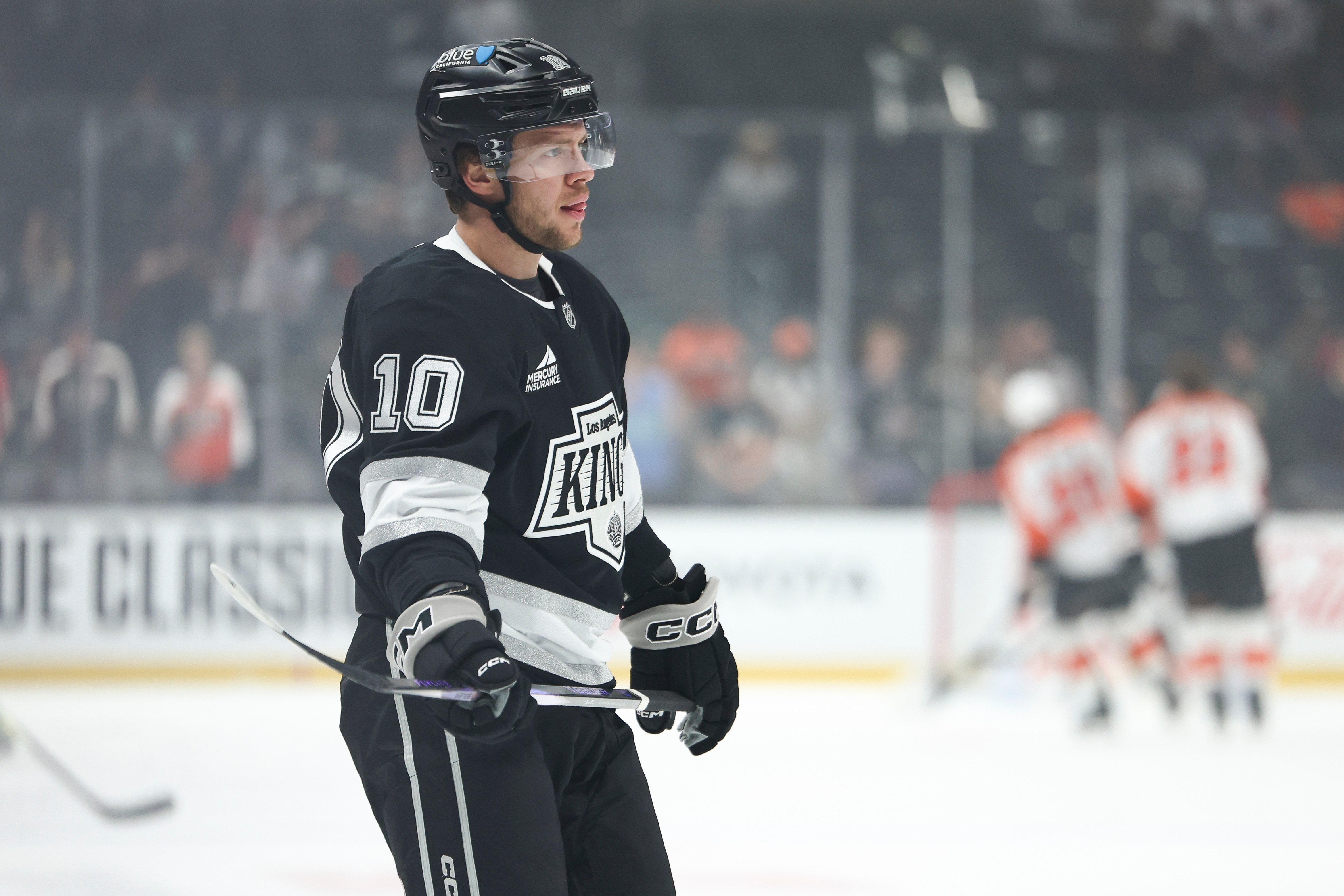 Kings left wing Artemi Panarin looks on before a game...