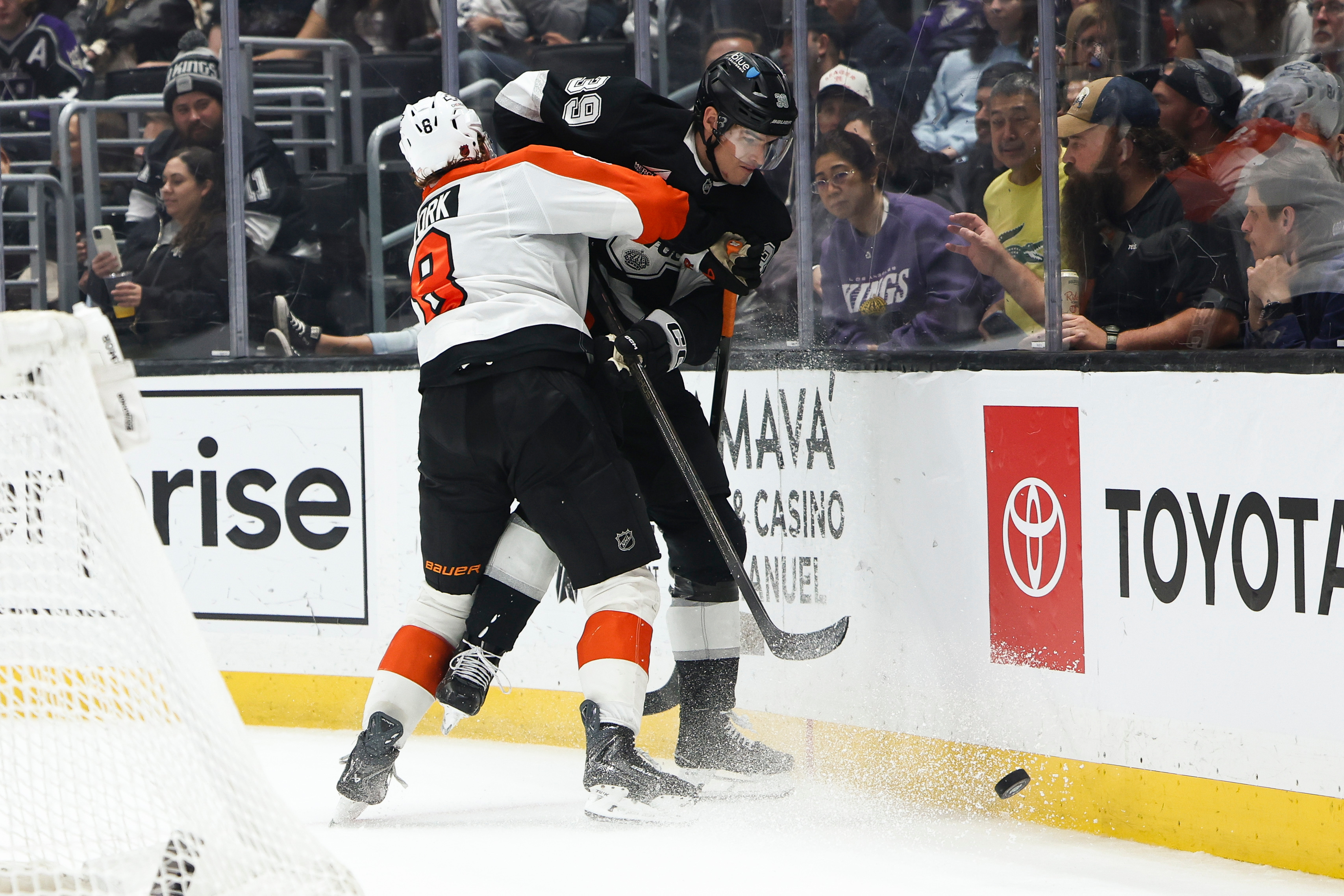 Philadelphia Flyers defenseman Cam York (8) checks Kings left wing...