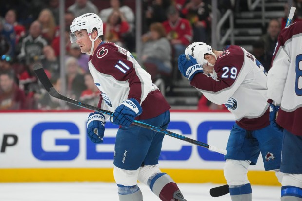 Colorado Avalanche center Brock Nelson (11) returns to the bench after scoring on the Chicago Blackhawks during the first period on Friday, March 20, 2026, in Chicago. (AP Photo/Erin Hooley)