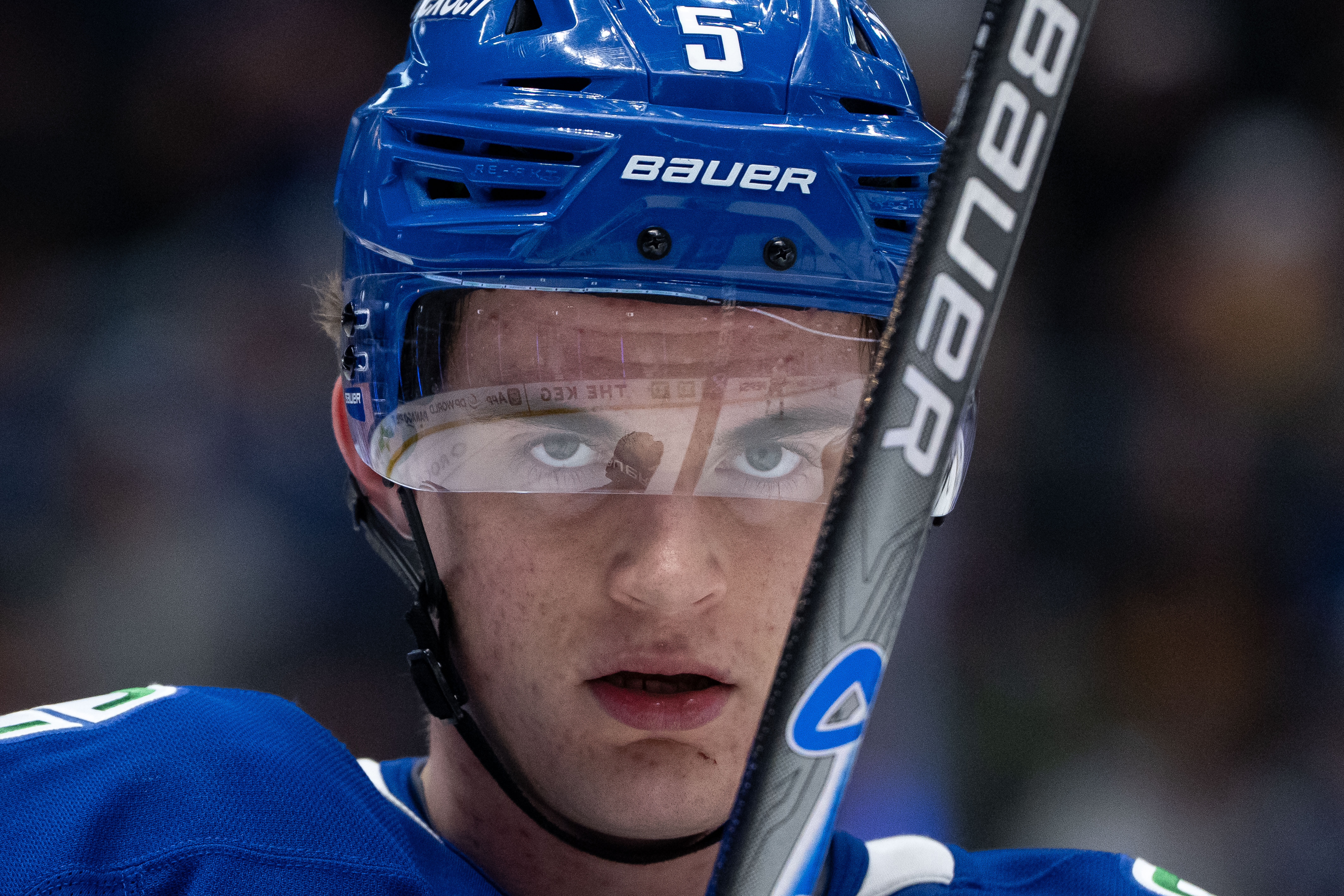 The Vancouver Canucks’ Tom Willander waits for a faceoff against...