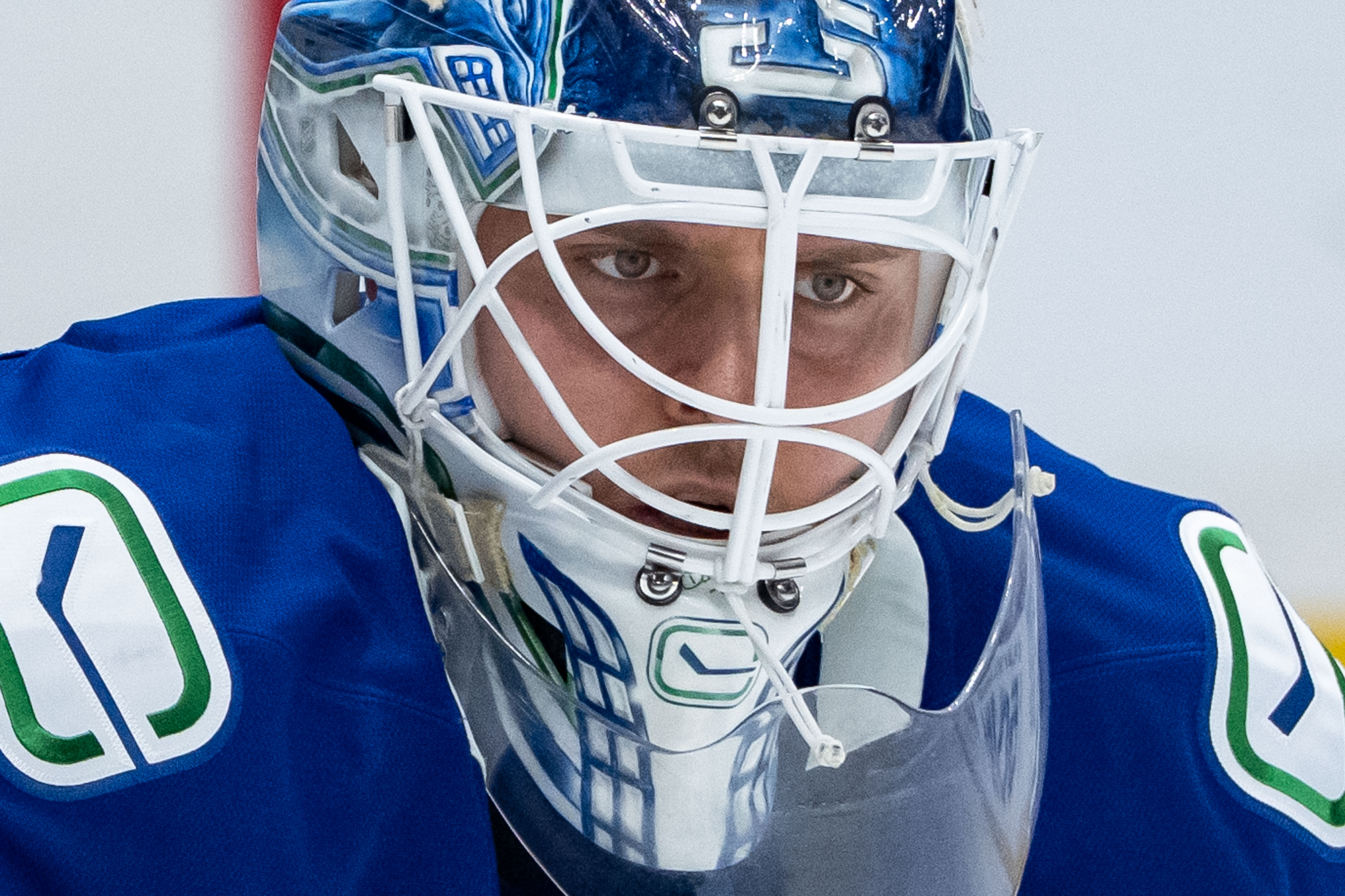 Vancouver Canucks goaltender Kevin Lankinen waits for a faceoff against...