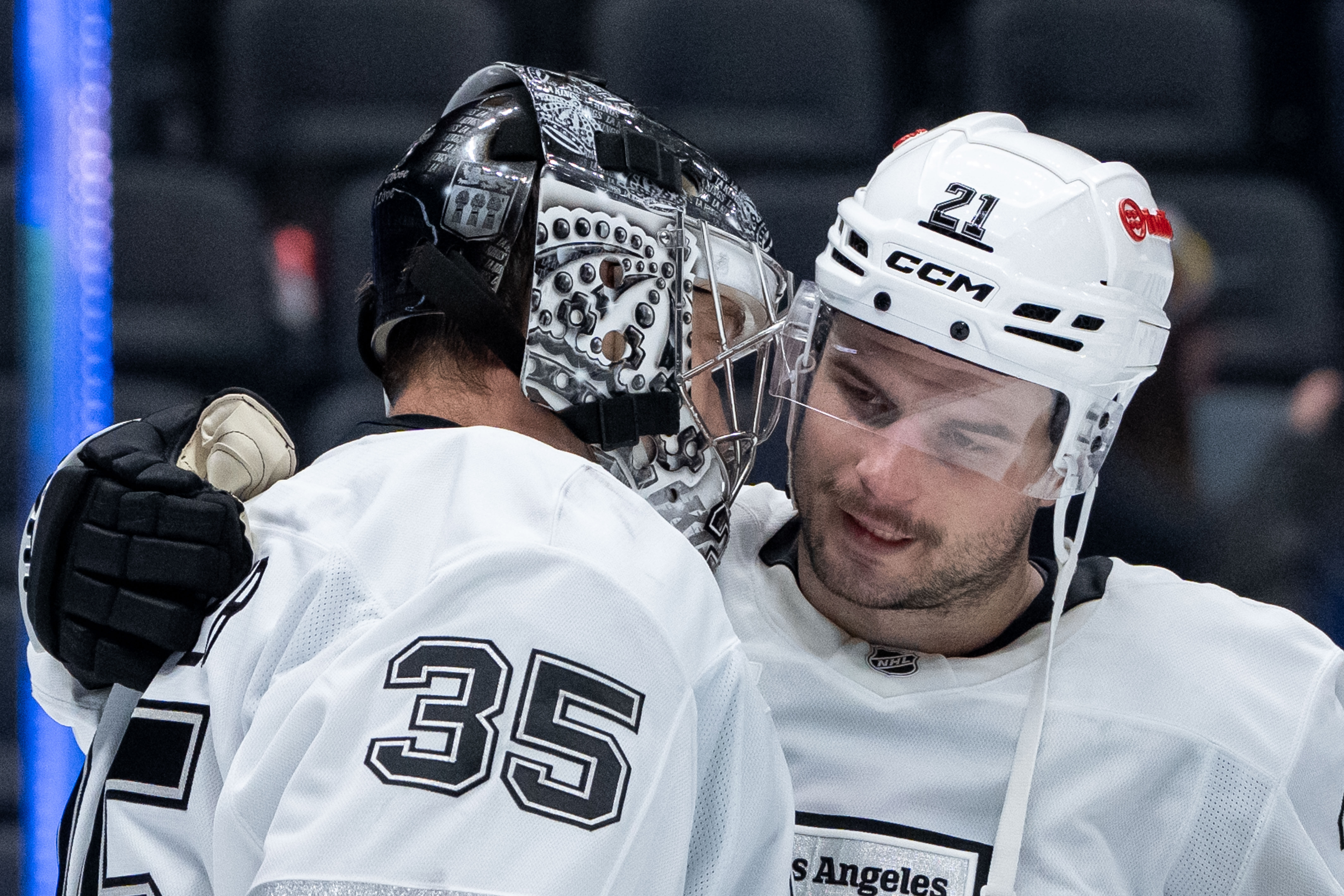 Kings goaltender Darcy Kuemper, left, celebrates with Scott Laughton after...