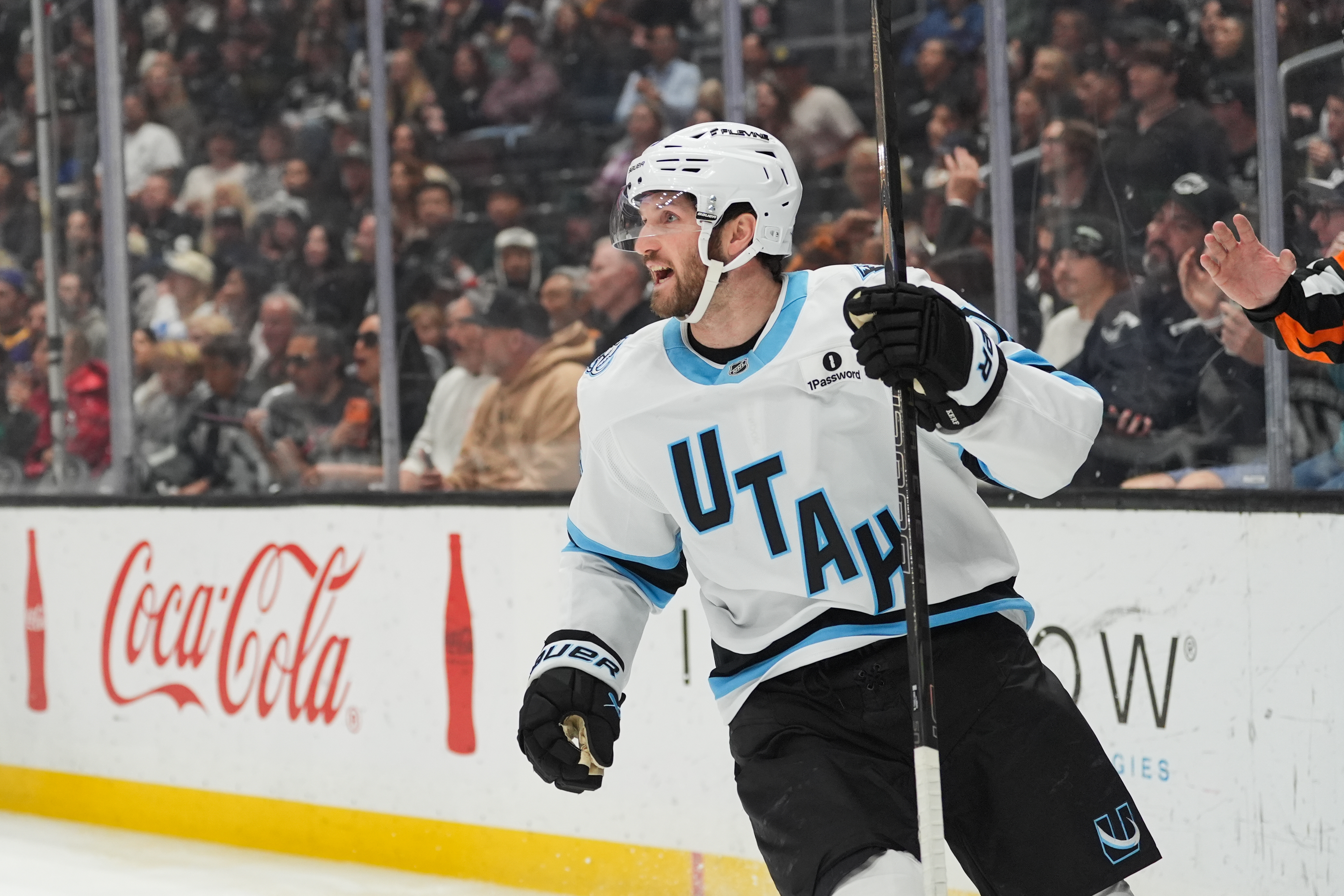 Utah Mammoth center Alexander Kerfoot (15) celebrates his goal during...