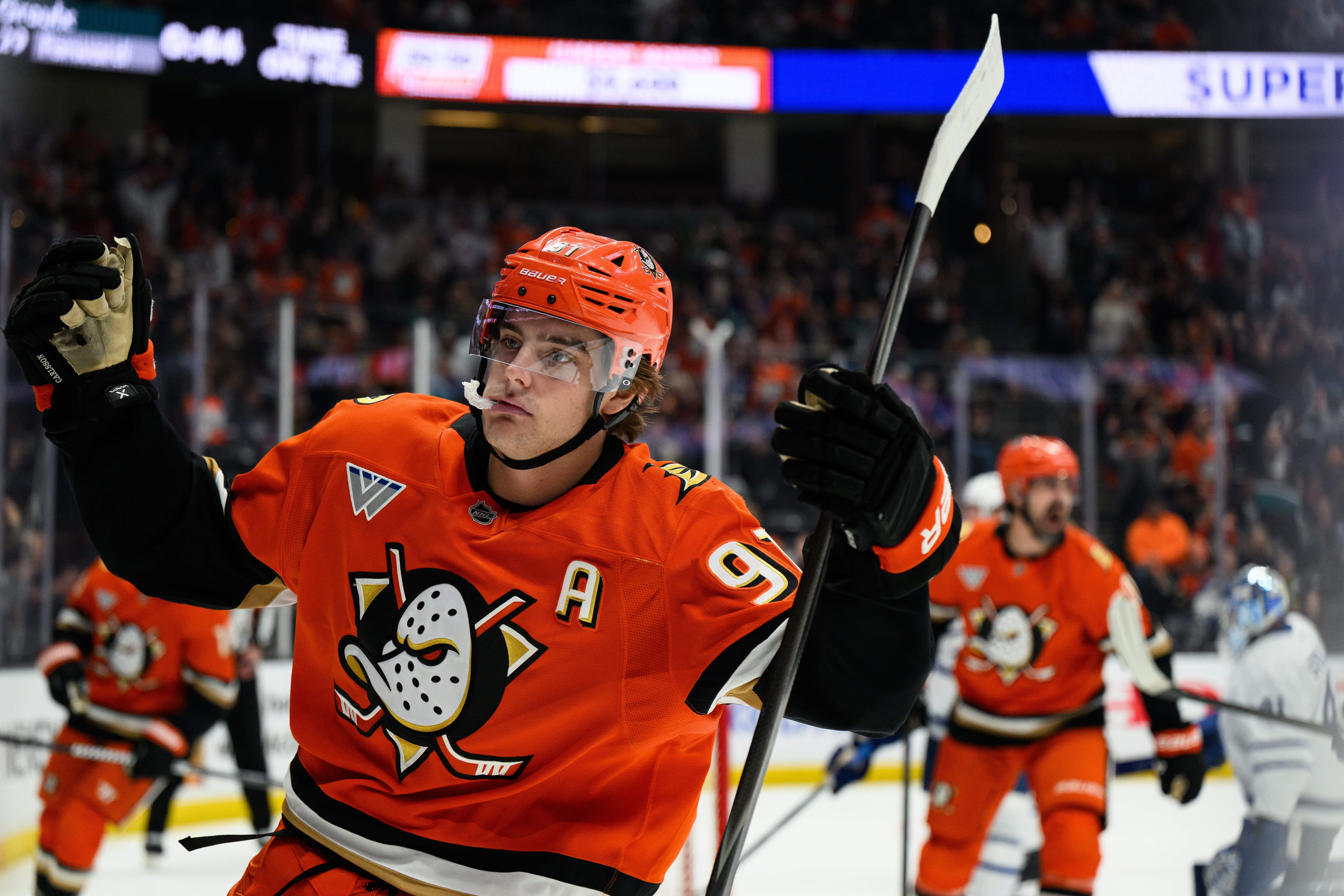 Ducks center Leo Carlsson reacts after scoring during the first...