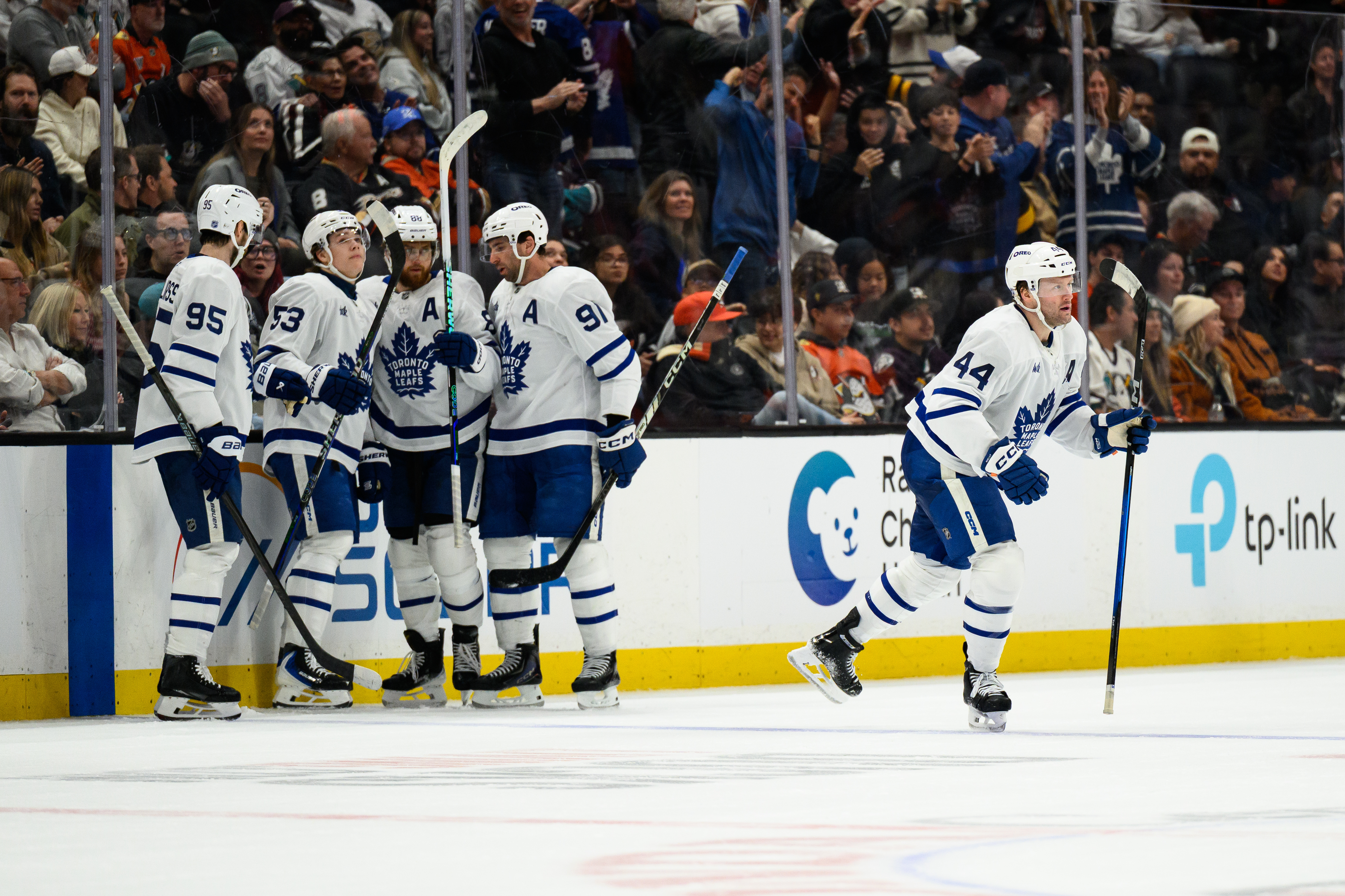 Toronto Maple Leafs defenseman Morgan Rielly (44) skates to the...