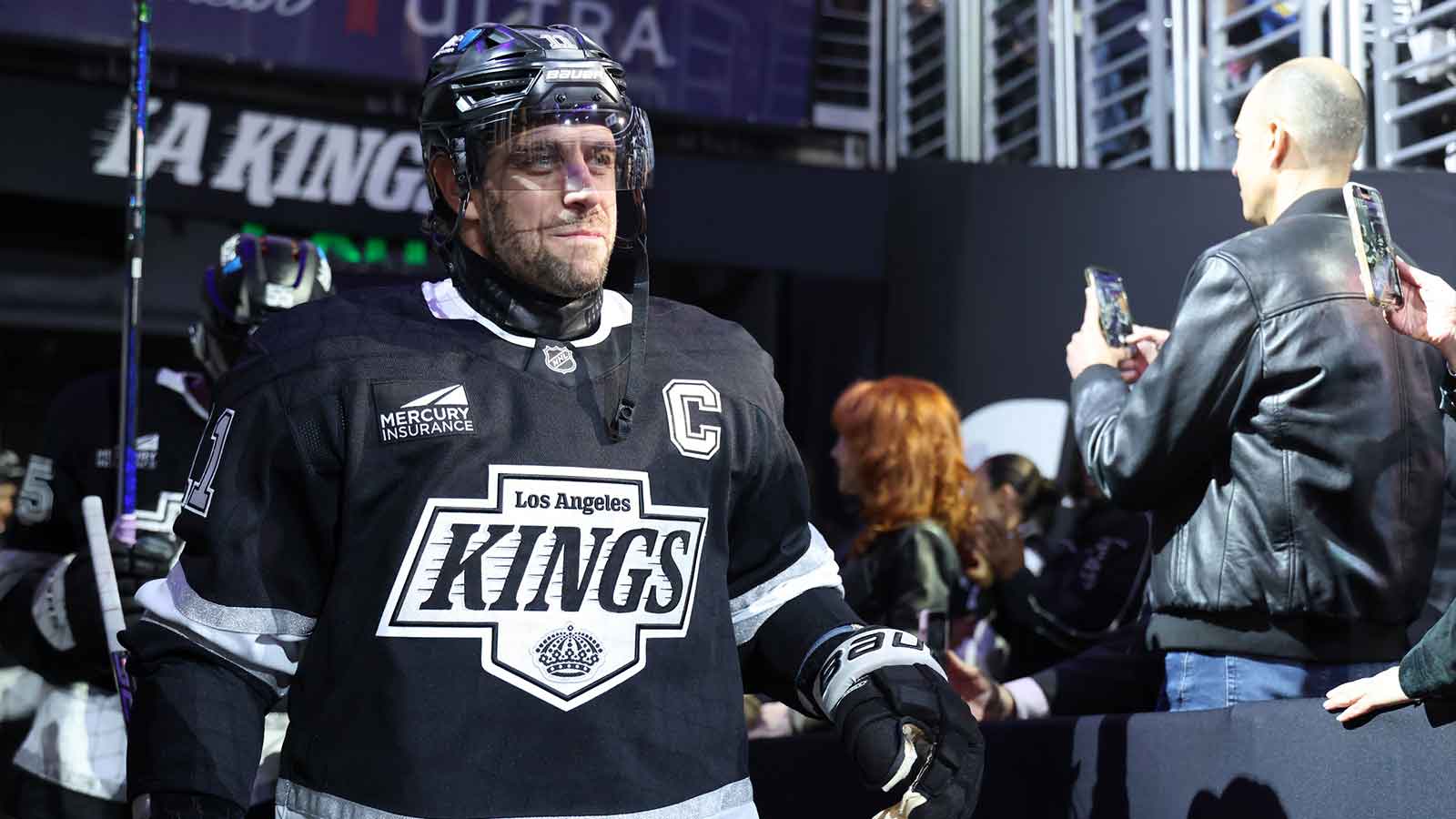 Los Angeles Kings center Anze Kopitar (11) enters the rink before the game against the Seattle Kraken at Crypto.com Arena.