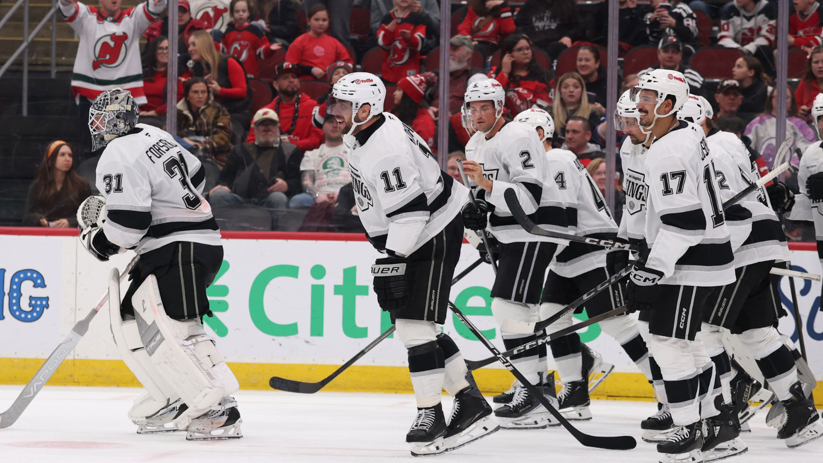 Los Angeles Kings center Anze Kopitar (11) celebrates his goal against the New Jersey Devils during the third period at Prudential Center. Kopitar became the Kings all-time leading scorer with the goal.