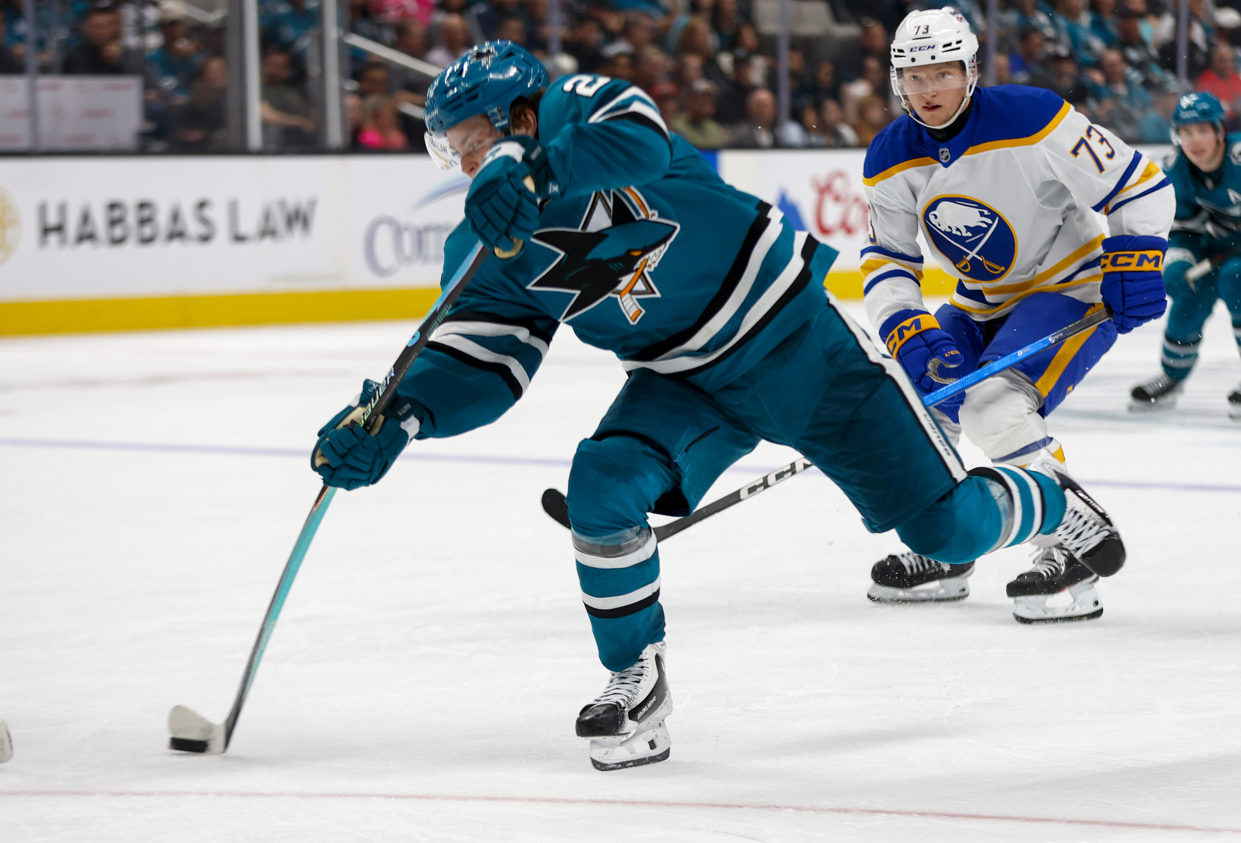 San Jose Sharks' Will Smith (2) takes a shot against...