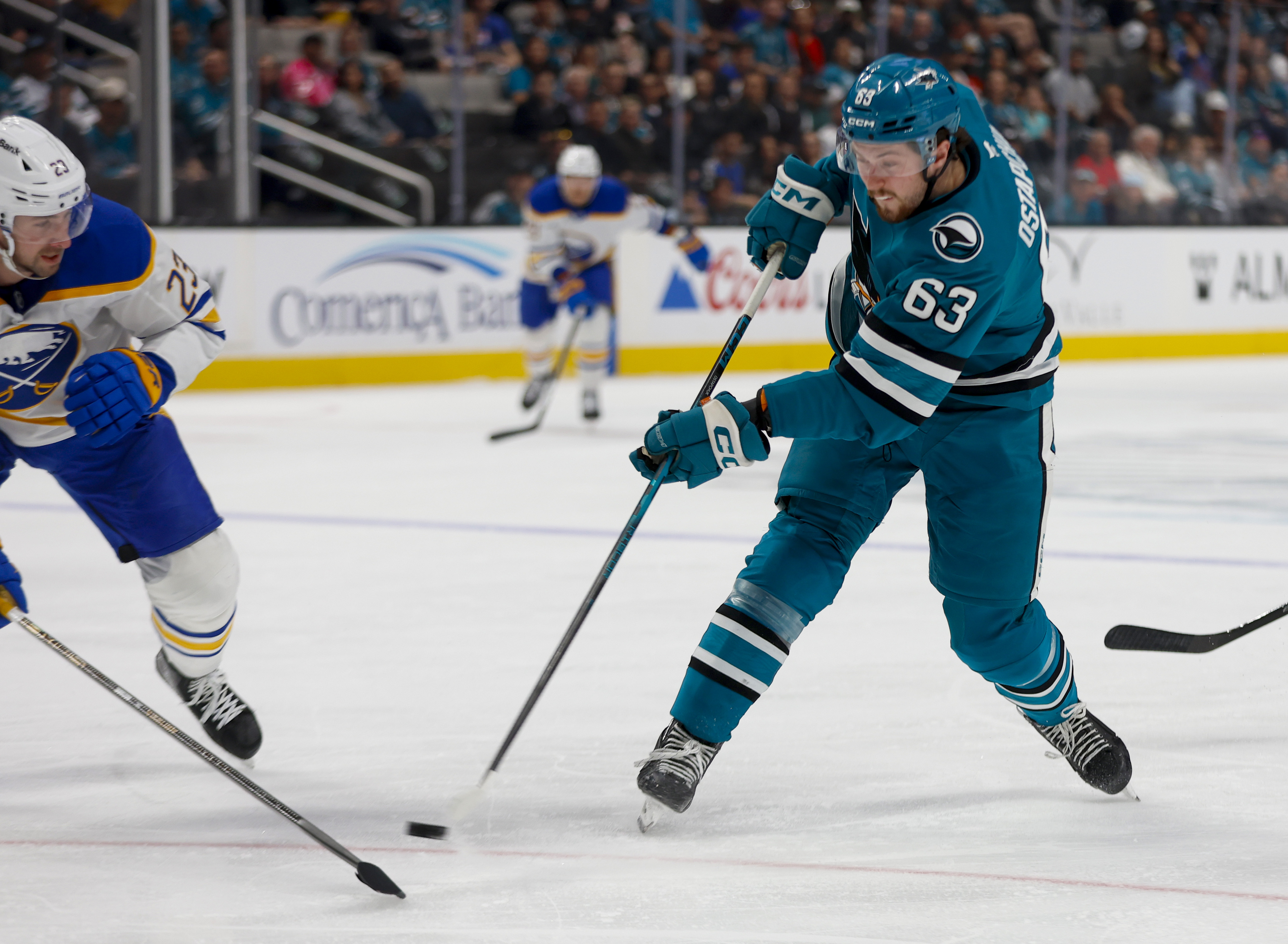 San Jose Sharks' Zack Ostapchuk (63) takes a shot against...