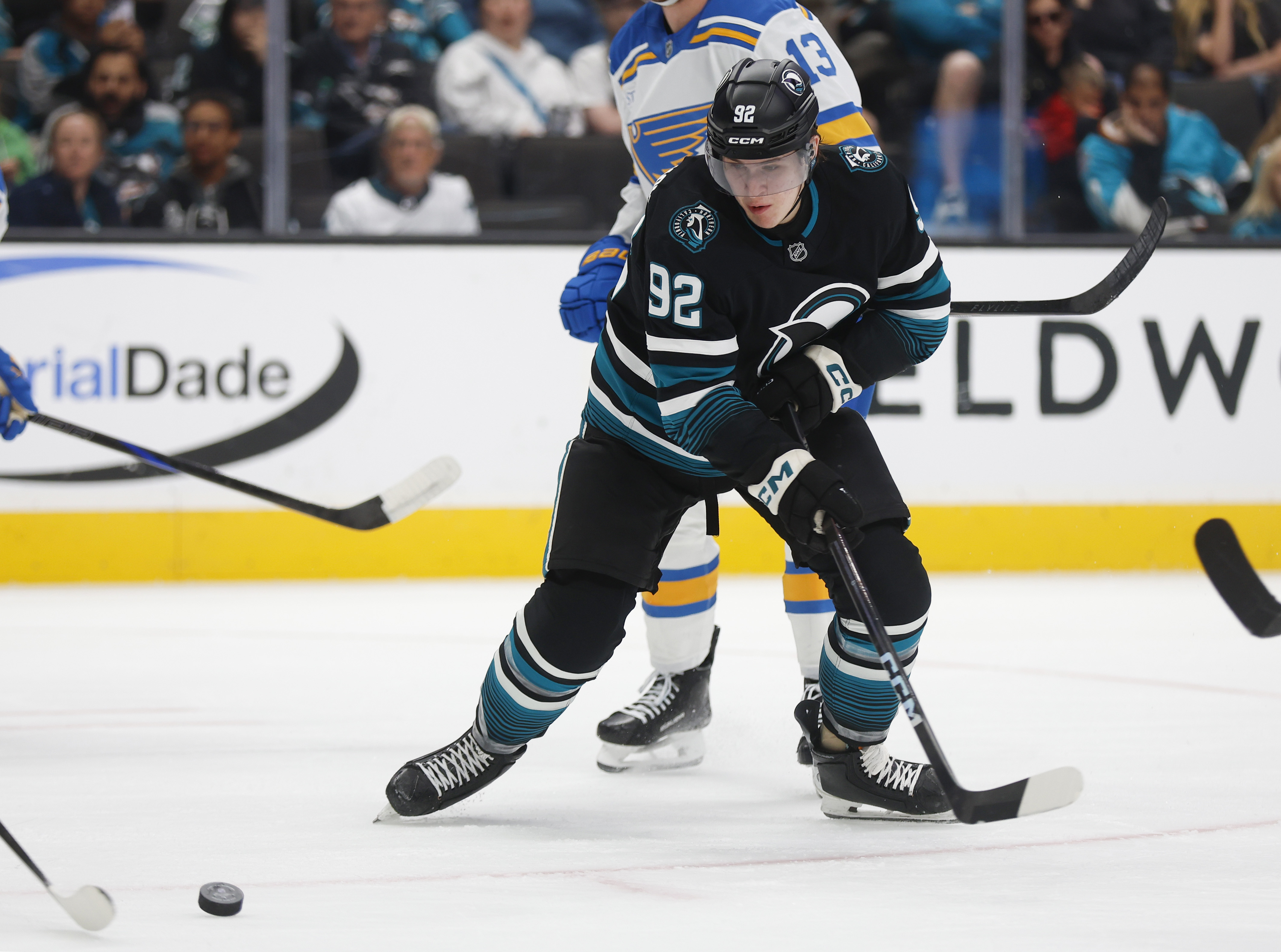 San Jose Sharks’ Igor Chernyshov (92) fights for the puck...