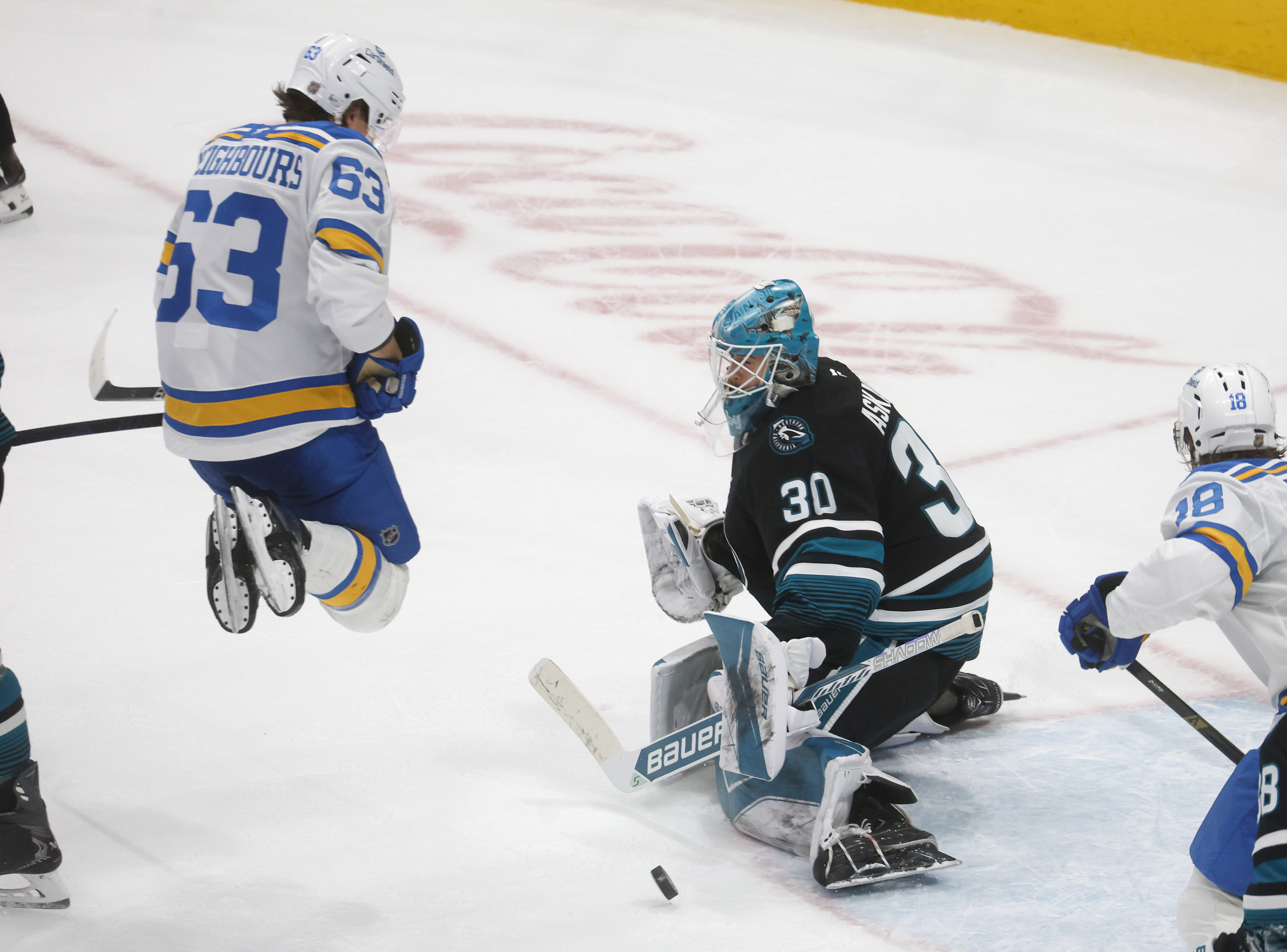 San Jose Sharks goaltender Yaroslav Askarov (30) blocks a shot...