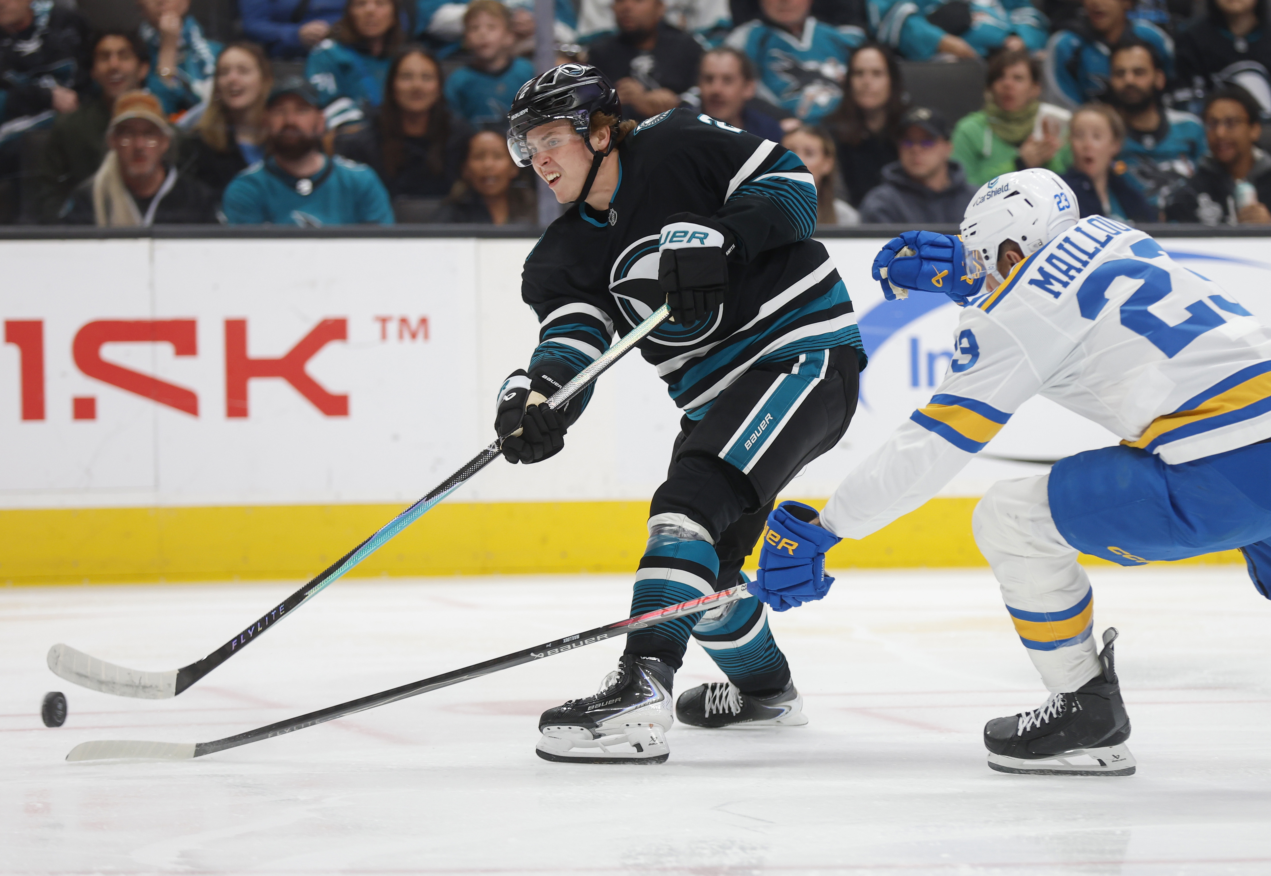 San Jose Sharks’ Will Smith (2) takes a shot against...