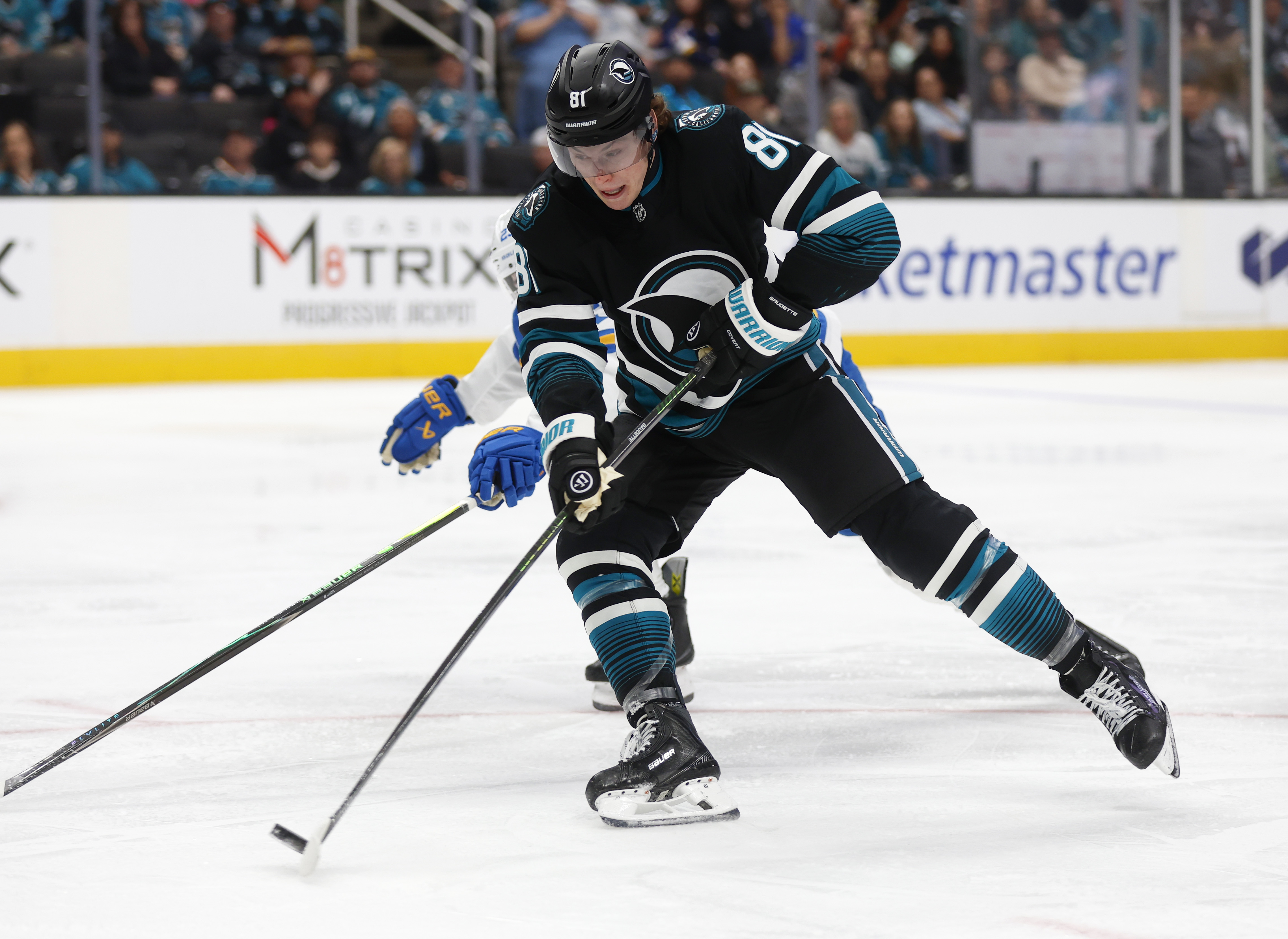San Jose Sharks’ Adam Gaudette (81) takes a shot against...