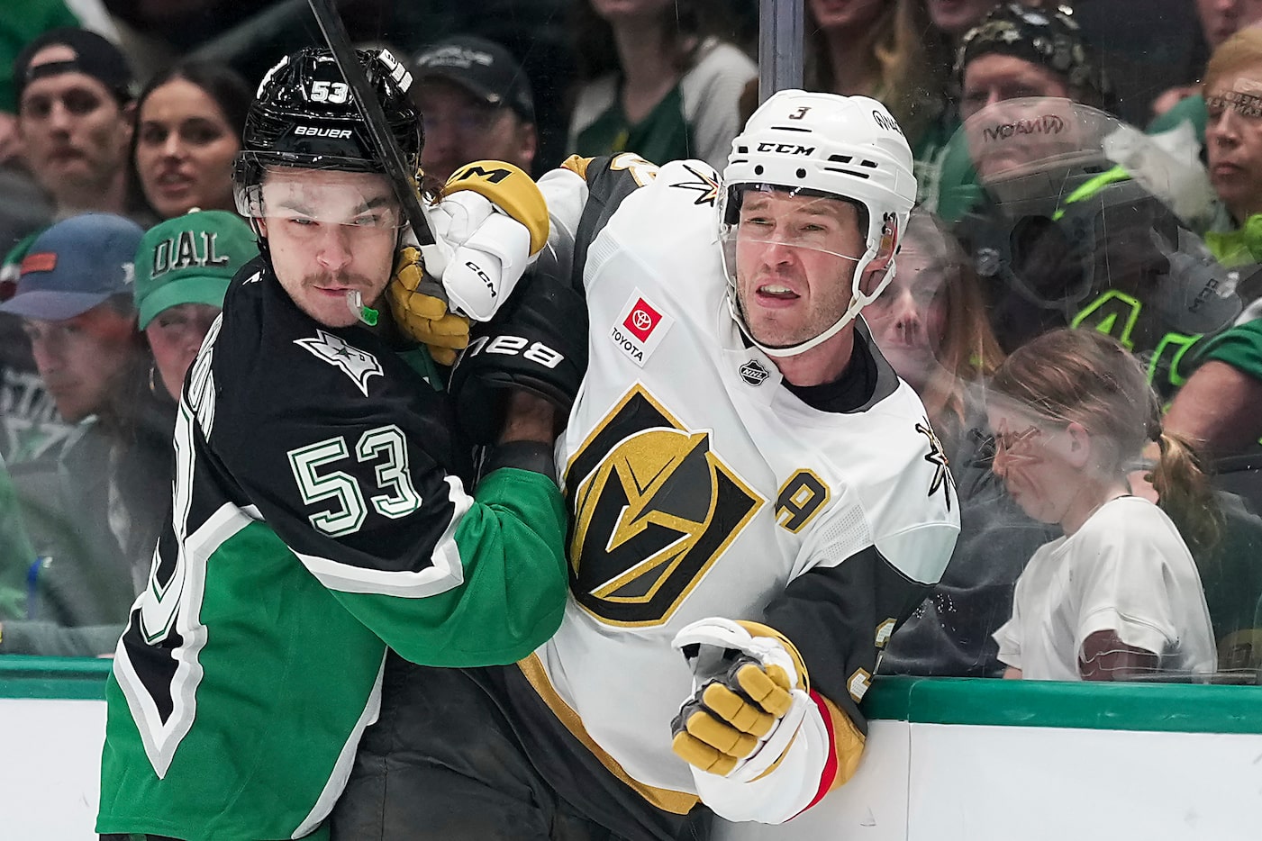Dallas Stars center Wyatt Johnston (53) checks Vegas Golden Knights defenseman Brayden...