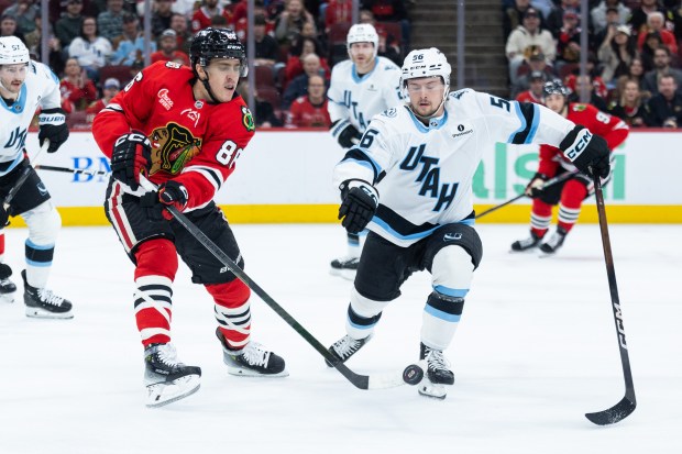 Chicago Blackhawks center Teuvo Teravainen (86) skates with the puck against Utah Mammoth right wing Kailer Yamamoto (56) in the first period against the Mammoth on Monday, March, 9, 2026, at the United Center. (Josh Boland/Chicago Tribune)