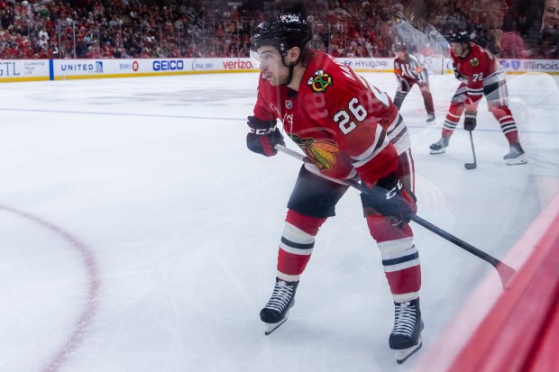 Chicago Blackhawks left wing Andrew Mangiapane (26) sets himself before a face-off in the third period against the Mammoth on Monday, March, 9, 2026, at the United Center. (Josh Boland/Chicago Tribune)