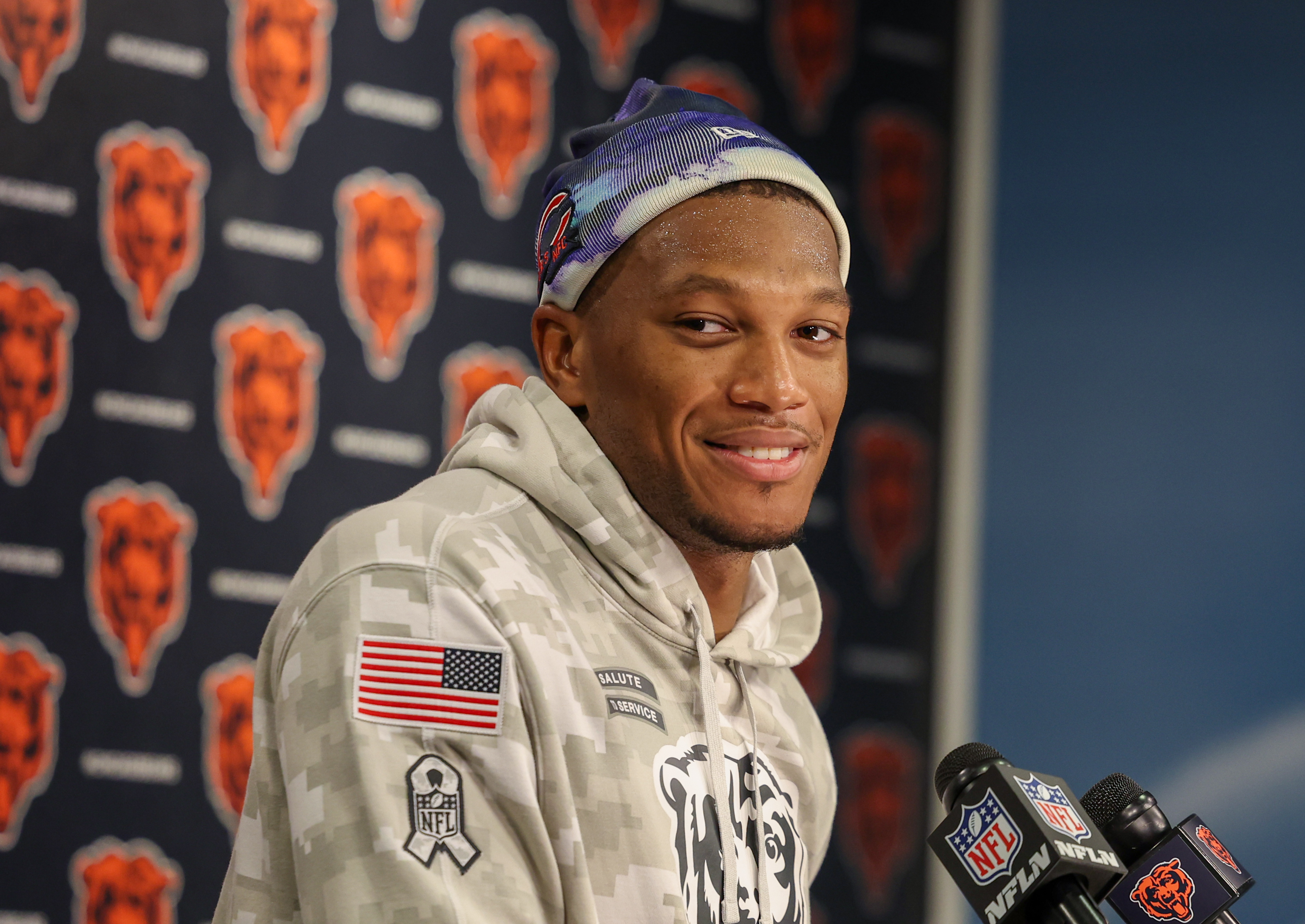 Chicago Bears wide receiver DJ Moore (2) speaks to the...