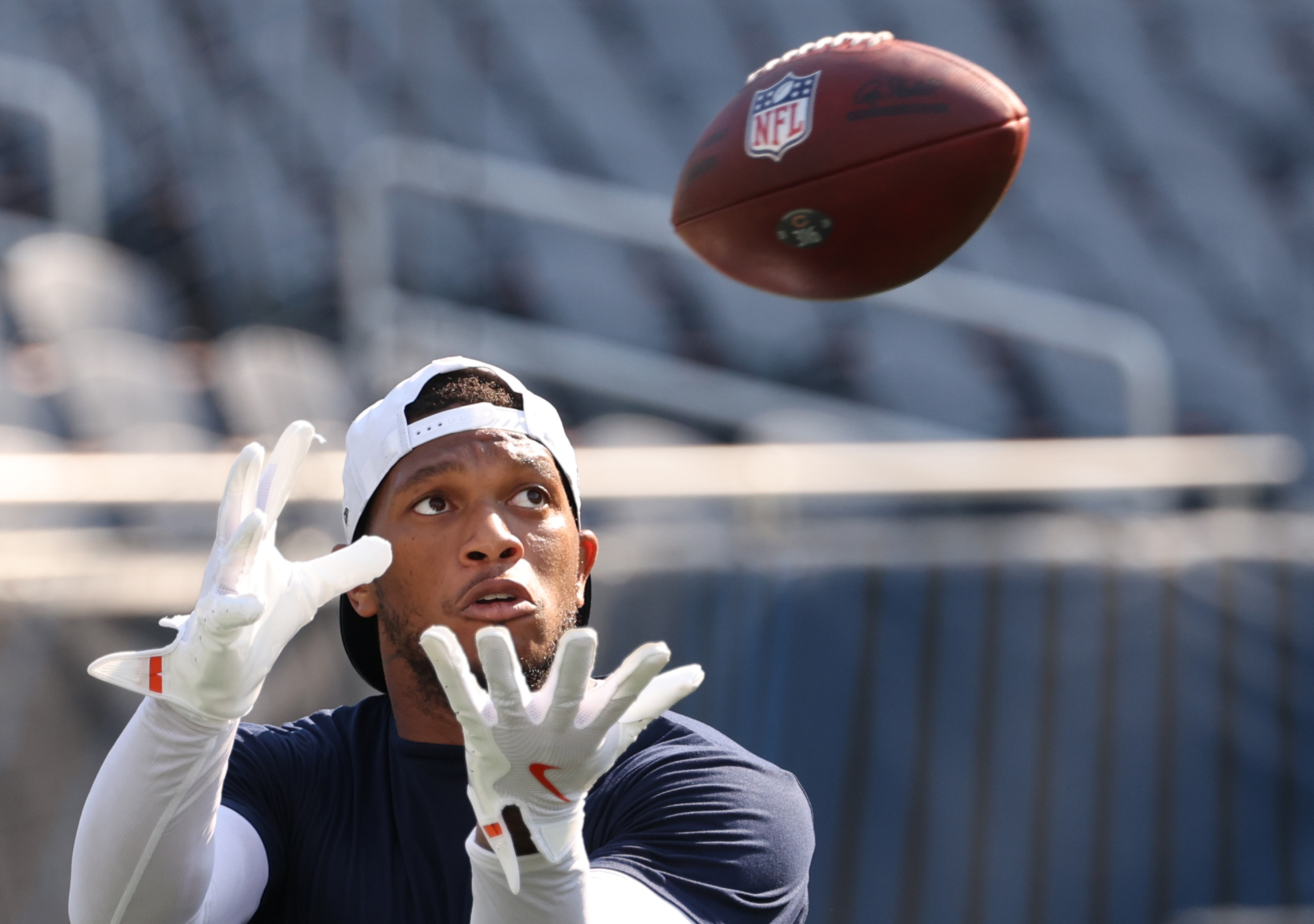 Bears wide receiver DJ Moore catches a pass thrown by...