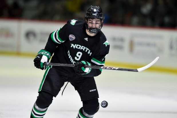 North Dakota forward Sacha Boisvert skates against Cornell on Nov. 2, 2024, in Ithaca, N.Y. (AP Photo/Adrian Kraus)