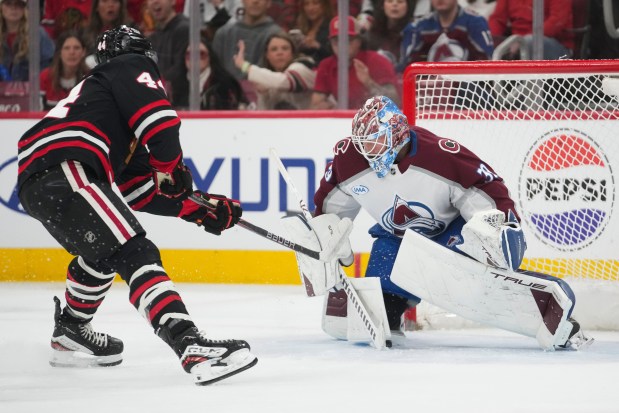 Blackhawks defenseman Wyatt Kaiser scores against Avalanche goaltender MacKenzie Blackwood during the second period Friday, March 20, 2026, at the United Center. (Erin Hooley/AP)